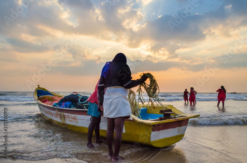 Photography Fishermen going to fishing from the shores of Mamallapuram aka Mahabalipuram in