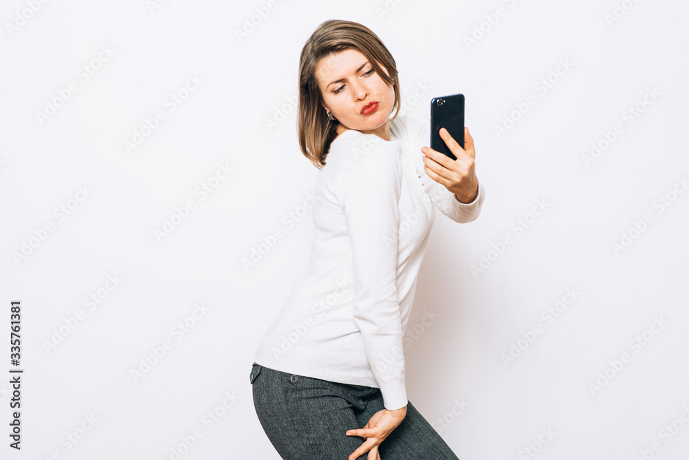 Fototapeta premium Woman taking selfie