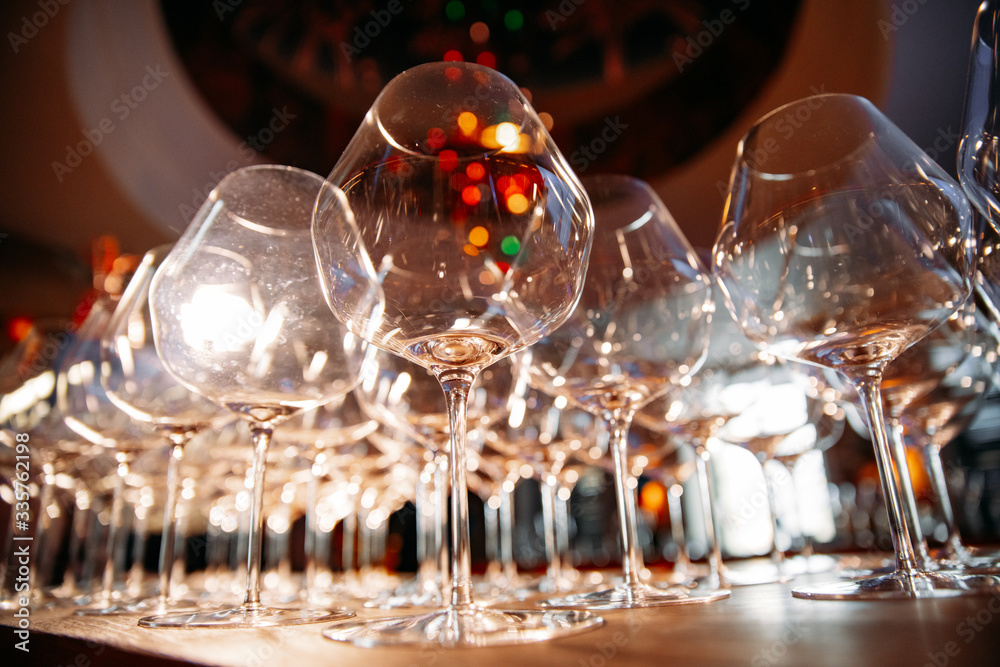empty wine glasses photographed at a wide angle from a low point with a blurred background