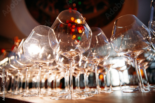 Obraz na płótnie empty wine glasses photographed at a wide angle from a low point with a blurred background w salonie