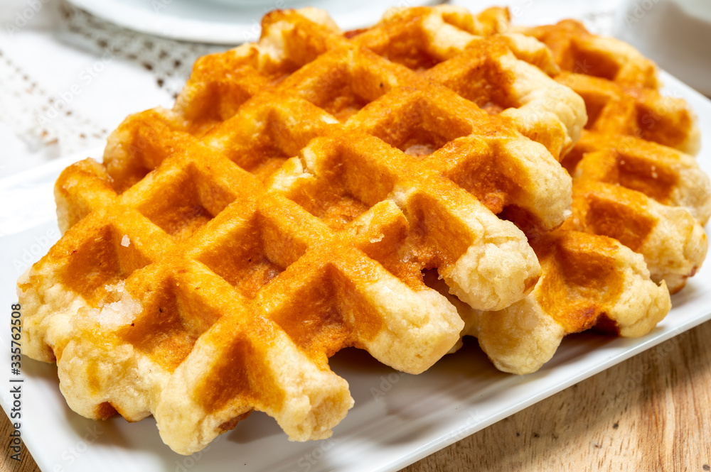 Tasty Belgian dessert, homemade Brussels sugar waffles Tasty Belgian dessert, homemade Brussels sugar waffles