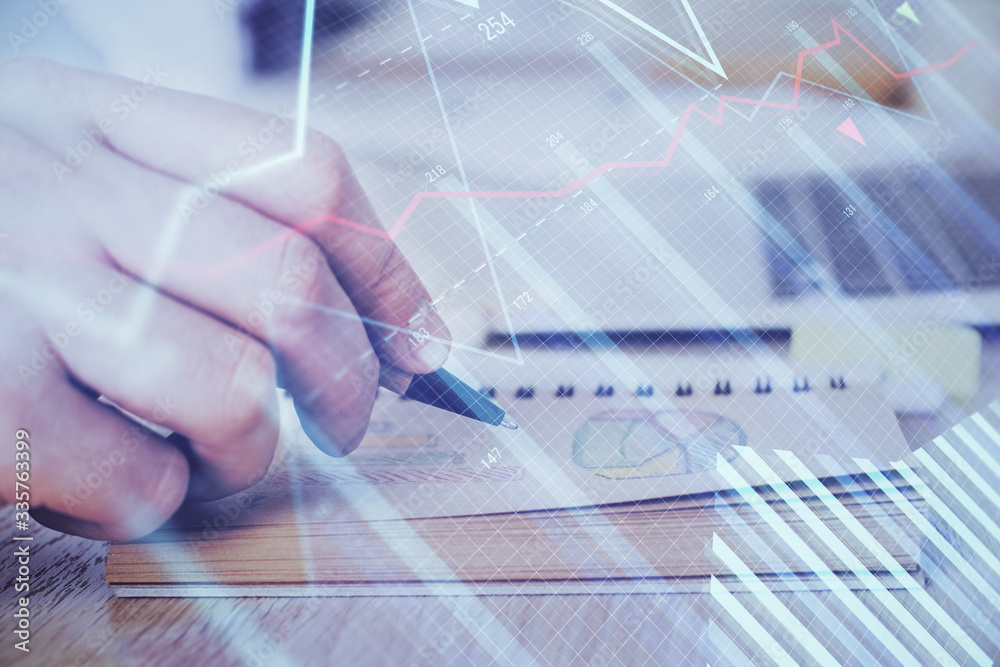 Multi exposure closeup hands with stock market forex graph. Multi exposure closeup hands with stock market forex graph.
