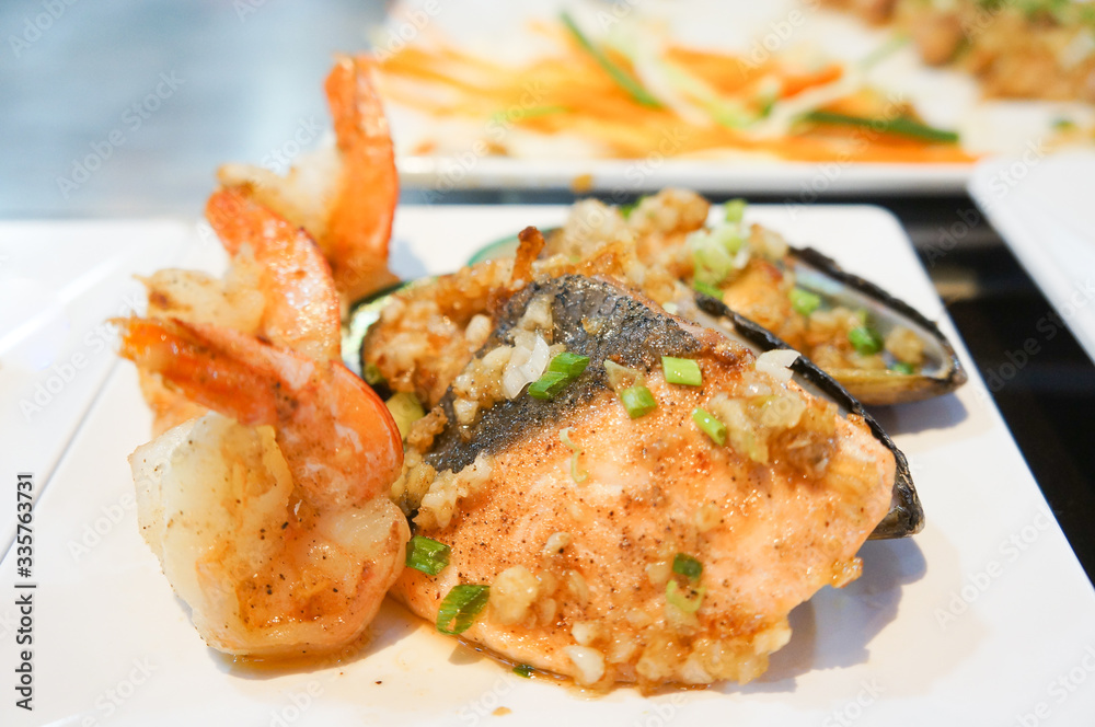 Mussels and prawns and seabass fried Mussels and prawns and seabass fried