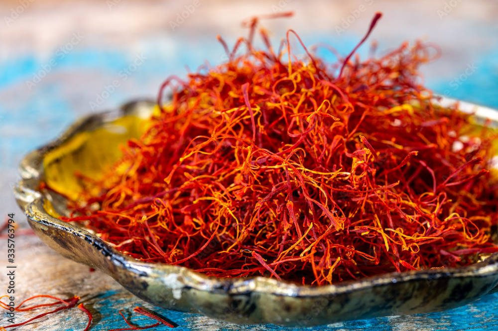 Fototapeta premium Real red dried shaffron spice close up