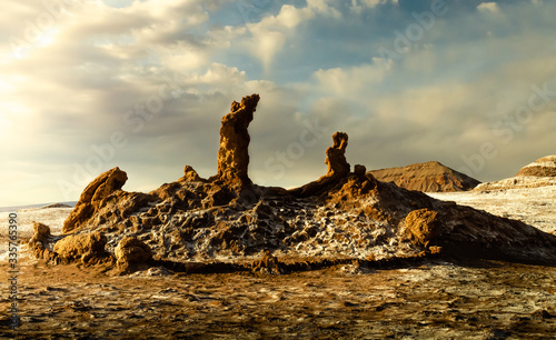 Photography Pair of stones sun salutation yoga position in the desert