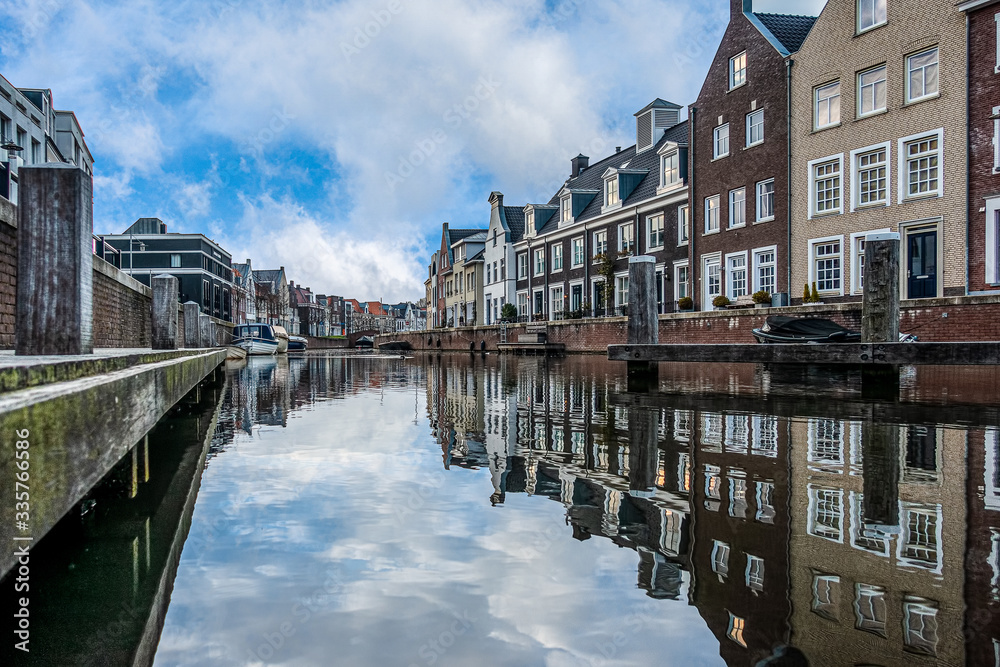 Houses along side a canal in a typical dutch city