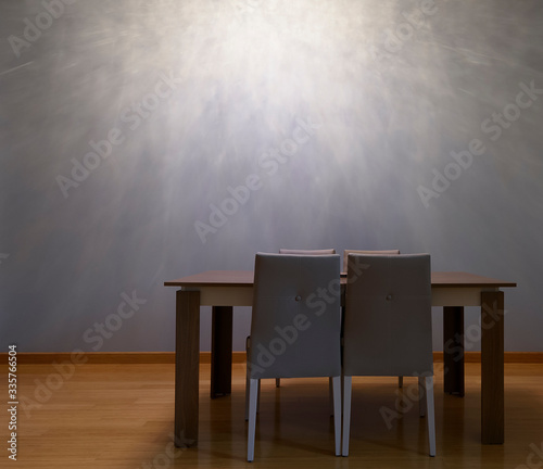 Modern seating arrangement with empty wall facade in the background shot for artists to place their painting frames. 