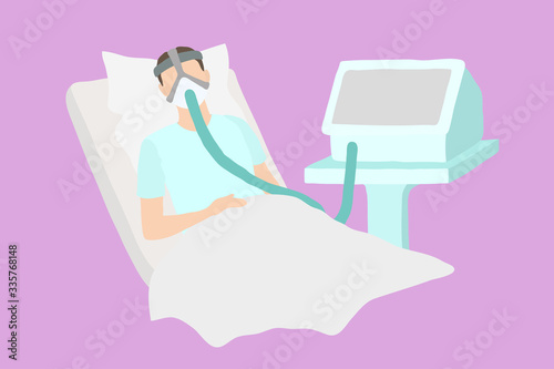 Patient lies in a hospital bed with connected artificial lung ventilation. A seriously ill man with a lung problem breathes using an artificial respiration apparatus. Pneumonia, coronavirus, pulmonary