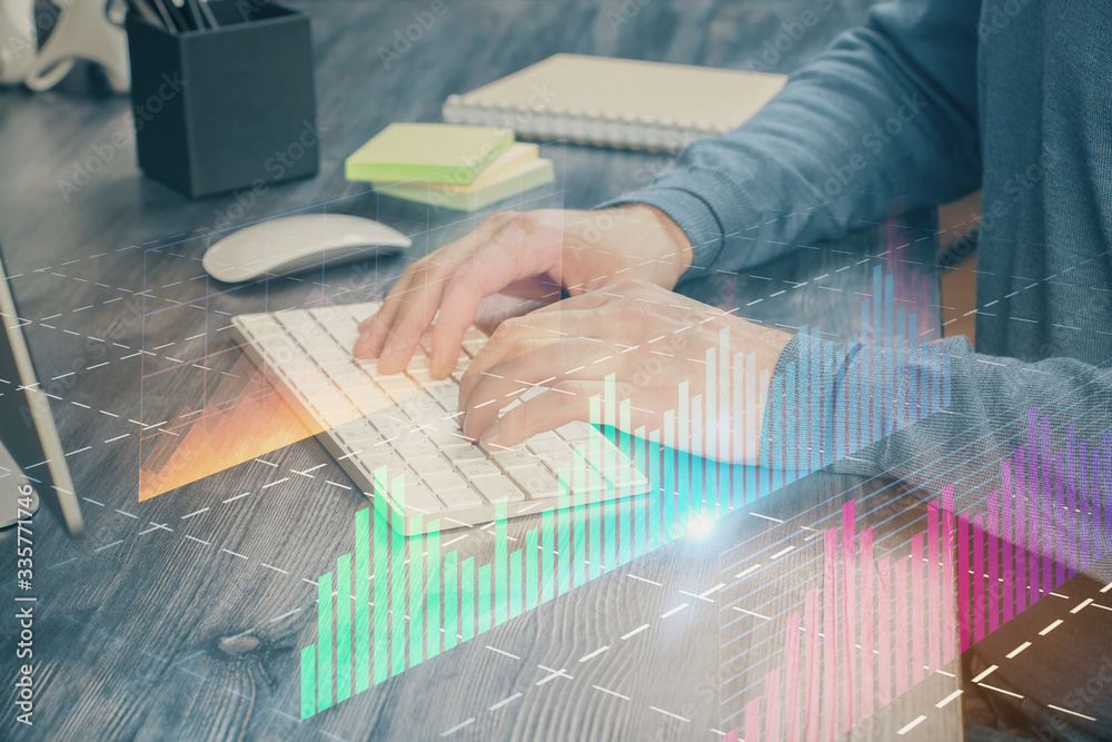 Stock graph with businessman typing on computer in office on background. Concept of analysis. Double exposure. Stock graph with businessman typing on computer in office on background. Concept of analysis. Double exposure.