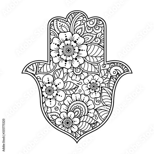 Hamsa hand drawn symbol with flower. Decorative pattern in oriental style for interior decoration and henna drawings. The ancient sign of "Hand of Fatima".
