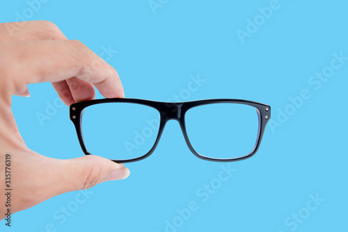 eyeglasses isolated on blue background