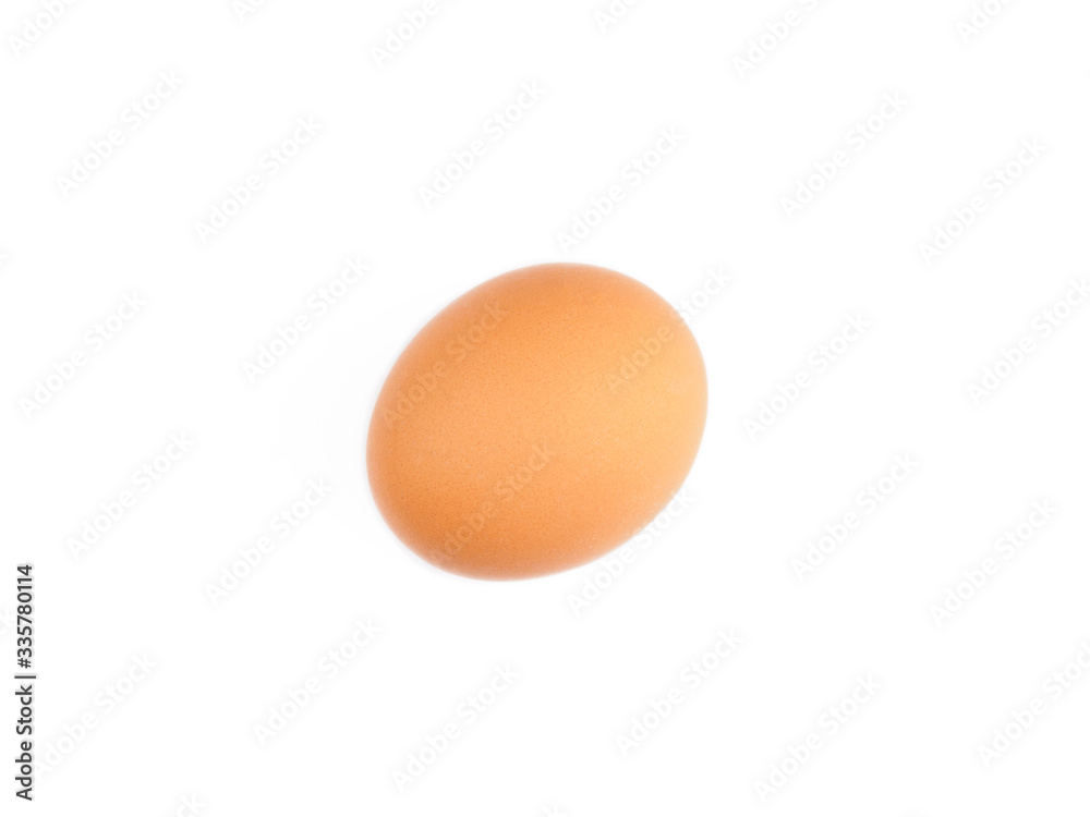 Brown egg on a white background. Healthy eating concept Brown egg on a white background. Healthy eating concept