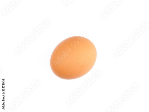 Brown egg on a white background. Healthy eating concept