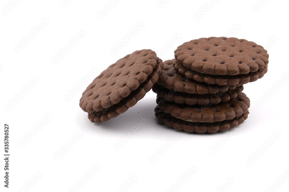 chocolate cream sandwich cookies with cream filling on a white background chocolate cream sandwich cookies with cream filling on a white background