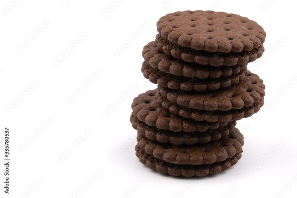 chocolate cream sandwich cookies with cream filling on a white background chocolate cream sandwich cookies with cream filling on a white background