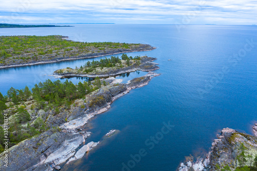 Russia. Karelia from the drone. Shooting Karelia from the air. Karelian landscape. Natural scenery. Lake Ladoga on a summer day. Ladoga skerries. Rocky island in lake Ladoga. Nature of Russia.