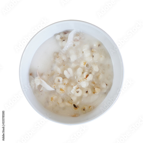Top view of Job's tears or Adlay millet seeds isolated on white background. Boiled of job's tears with coconut milk, Thai dessert with clipping path.