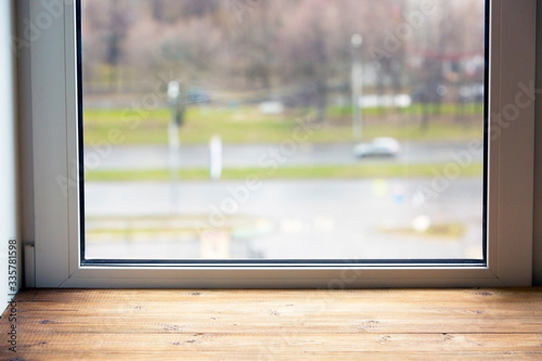 Window and wide wooden window sill
