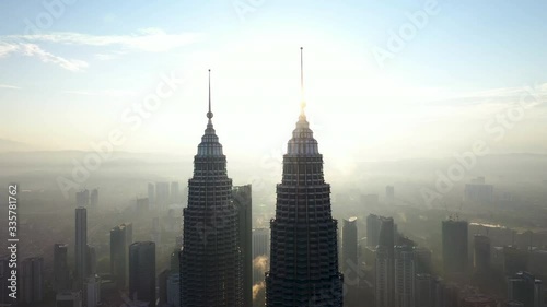 Kuala Lumpur, Malaysia Twin Tower, Aerial view Sunrise soft light with Low Fog. photo