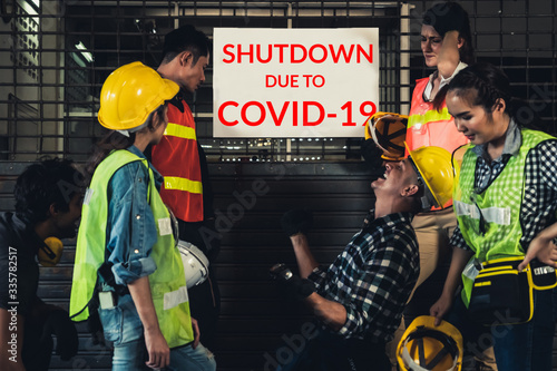 Factory shutdown due to outbreak of Coronavirus Disease 2019 or COVID-19. Concept of economic crisis, people unemployment and production