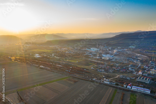 Aerial view of factory  in the sunset.