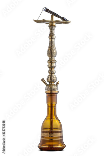 Isolated handcrafted engraved water pipe or hookah.