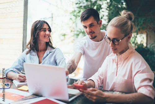 Businesspeople working together using electronic devices