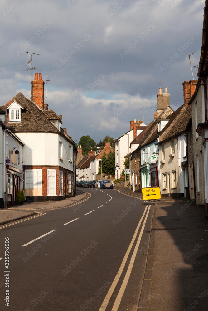 Faringdon (England), UK - August 05, 2015: The main road in Faringdon village, .Faringdon, Oxfordshire, England, United Kingdom.