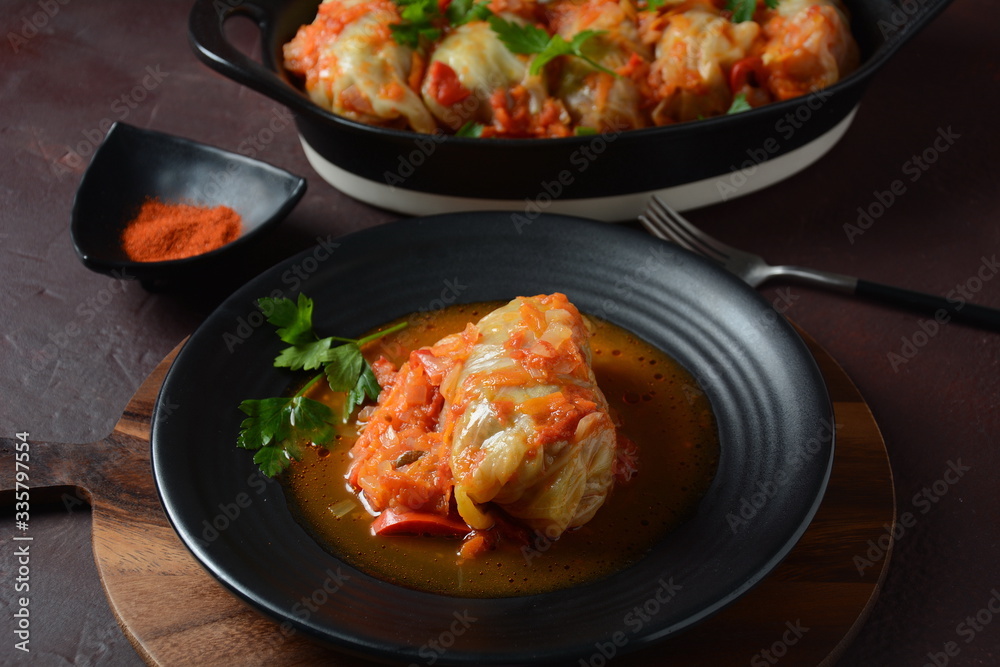 Cabbage rolls stuffed with ground beef and rice in tomato sauce Cabbage rolls stuffed with ground beef and rice in tomato sauce