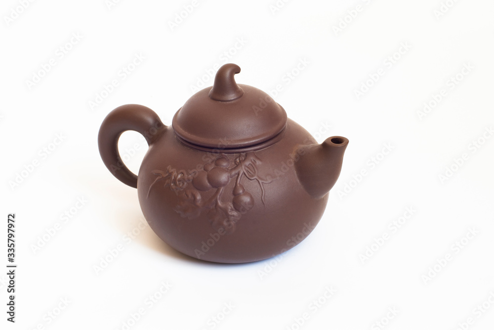 traditional Chinese teapot made of Issinclay clay, tea ceremonion, isolated on a white background, design