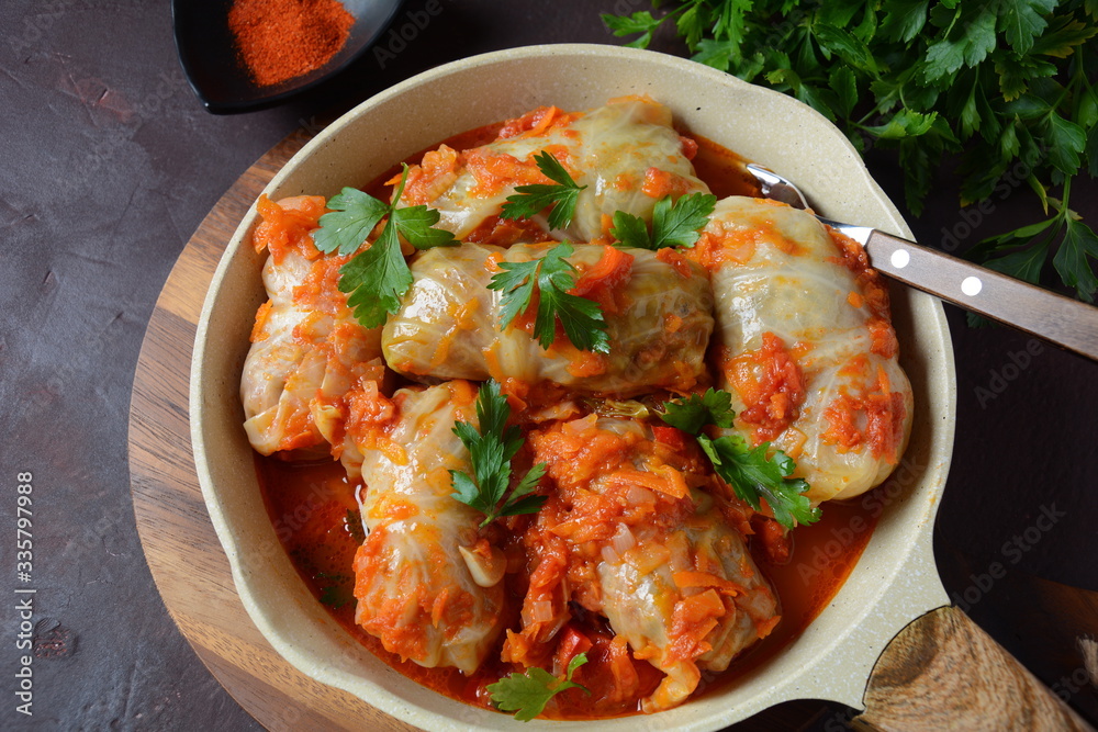 Cabbage rolls stuffed with ground beef and rice in tomato sauce Cabbage rolls stuffed with ground beef and rice in tomato sauce