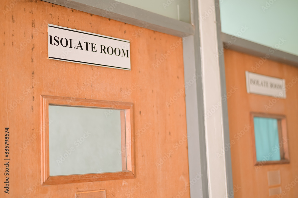 Door with label Isolation room sign room in rural or countryside hospital in thailand for prevent epidemic Covid-19 Door with label Isolation room sign room in rural or countryside hospital in thailand for prevent epidemic Covid-19