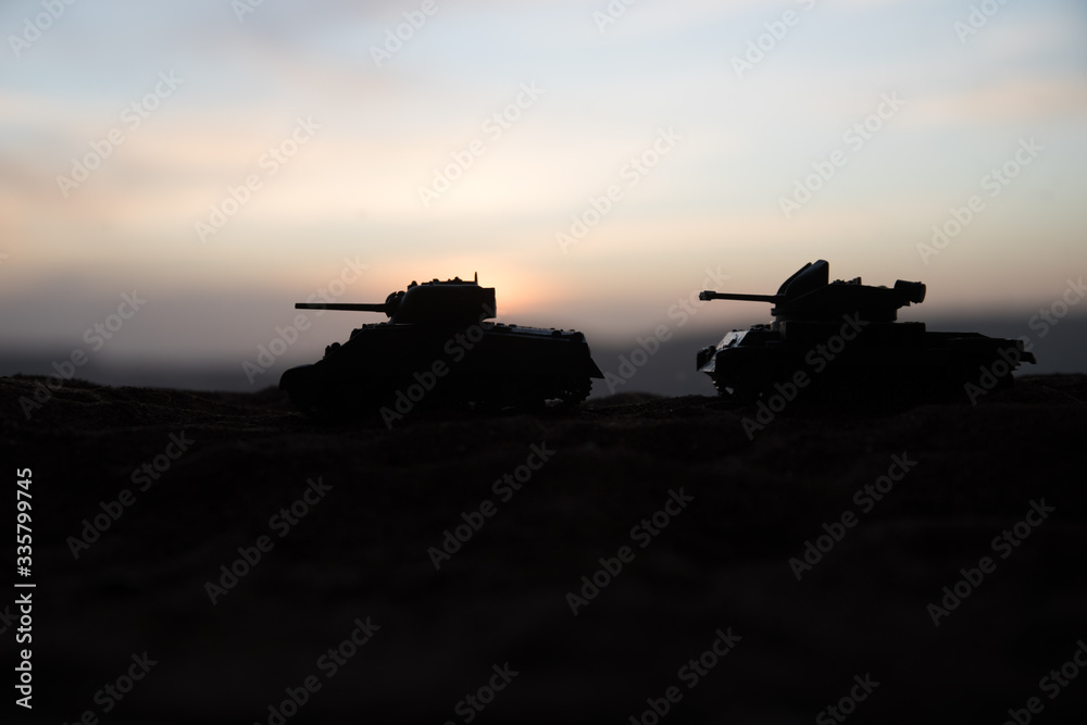 War Concept. Military silhouettes fighting scene on war fog sky background, World War Soldiers Silhouette Below Cloudy Skyline At sunset.