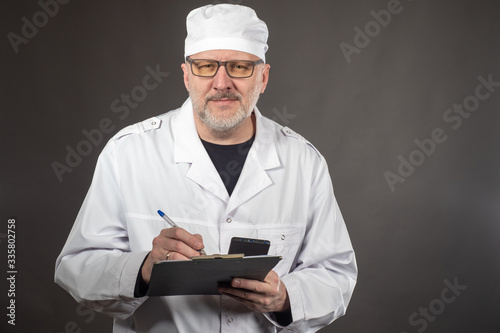 A friendly doctor listens t...