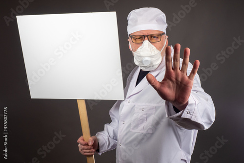 A doctor in a protective ma...