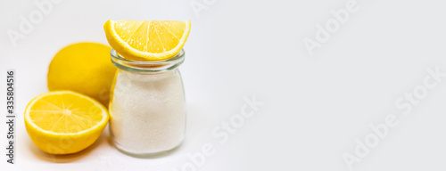 Citric acid on a white isolated background. Selective focus. photo