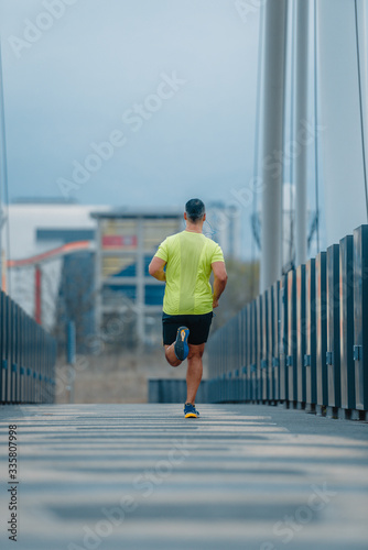 Fototapeta Naklejka Na Ścianę i Meble -  Athletic older runner
