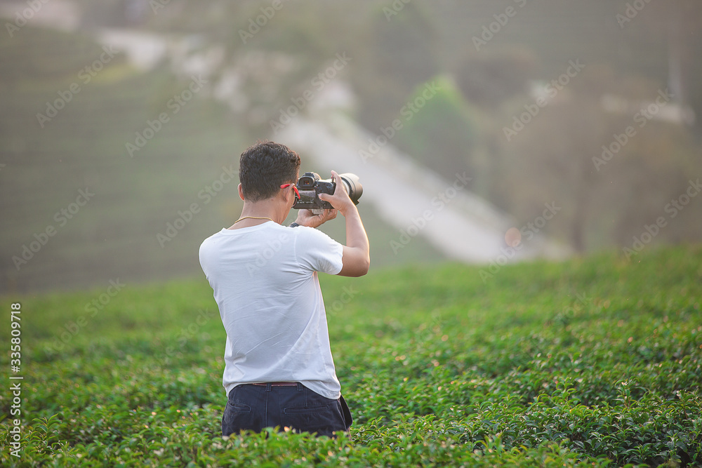 young photographer taking pictures young photographer taking pictures