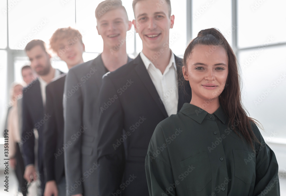 close up. young business people standing in line. close up. young business people standing in line.