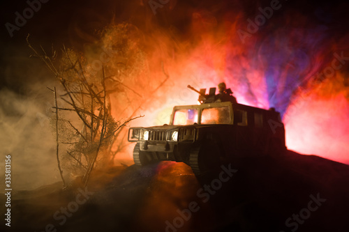 War Concept. Battle scene on war fog sky background  Fighting silhouettes Below Cloudy Skyline at night.