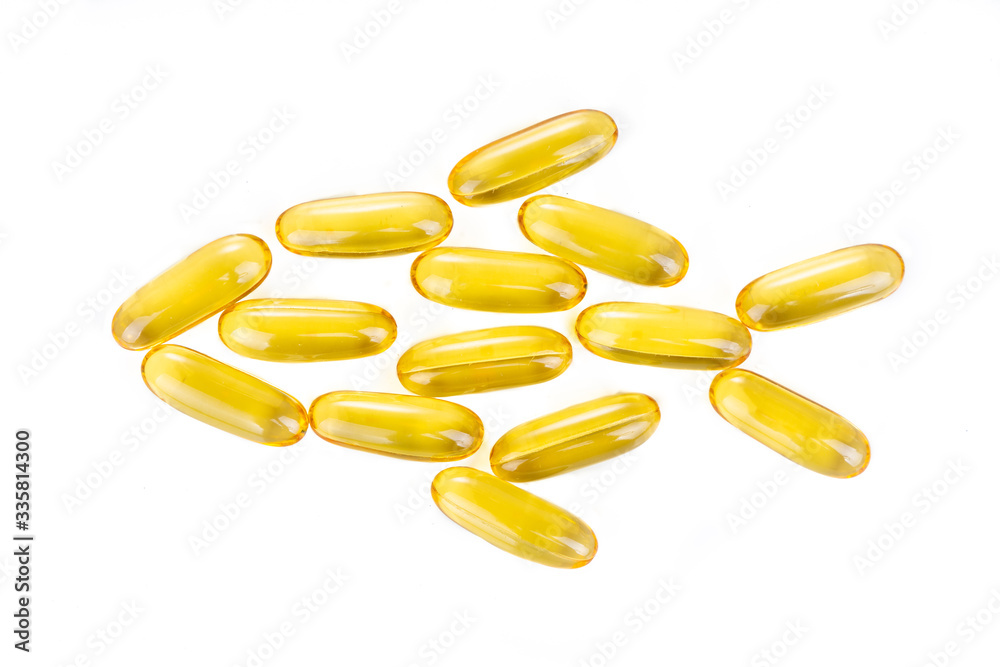 Omega-3 fish oil capsule arranged in fish shape.  It contains omega-3 polyunsaturated acid EPA and DHA enhances heart and health.