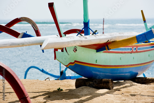 Fototapeta Naklejka Na Ścianę i Meble -  Traditional boats on Sanur Beach, Bali, Indonesia.