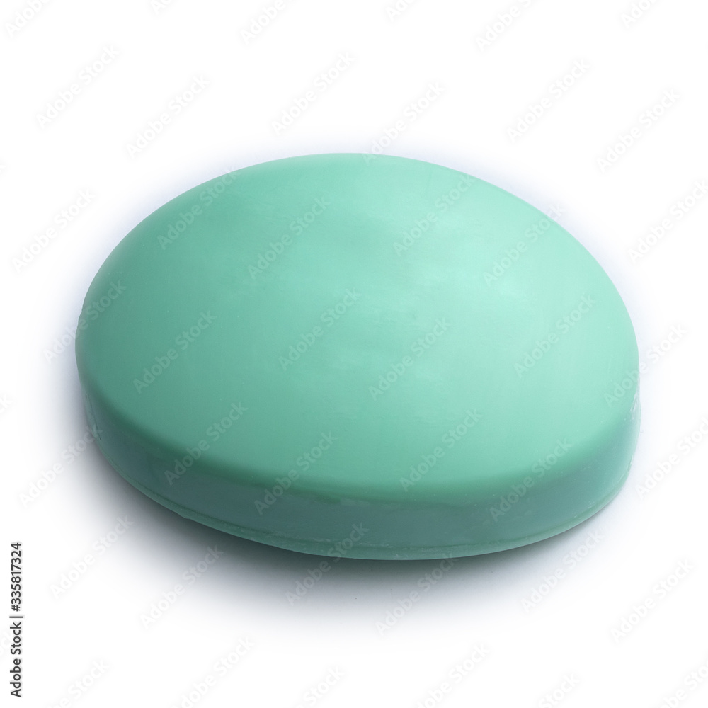 green soap with the taste of cucumber on a white background green soap with the taste of cucumber on a white background