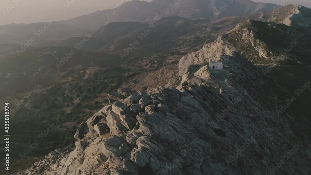 Drone flight over a church in mountains Drone flight over a church in mountains