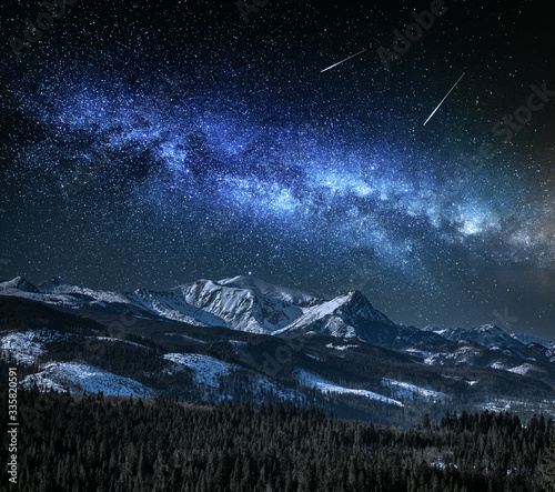 Fototapeta Naklejka Na Ścianę i Meble -  Milky way over snowy mountain in Tatras