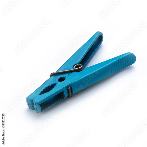blue clothespin for drying clothes on a white background