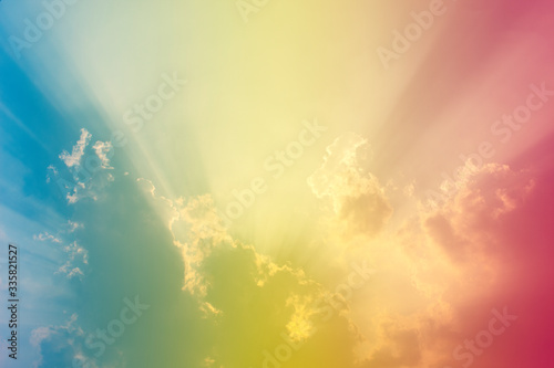 A soft fog cloug background with pastel colored orange to blue gradient photo