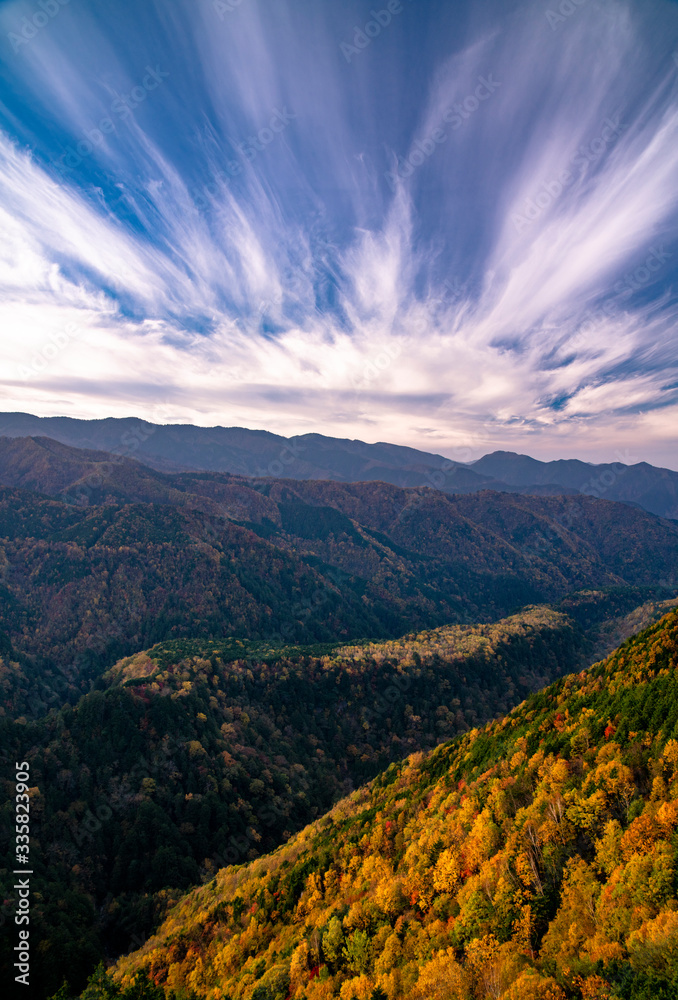 Wide sky view over autumn colorful mountain Wide sky view over autumn colorful mountain