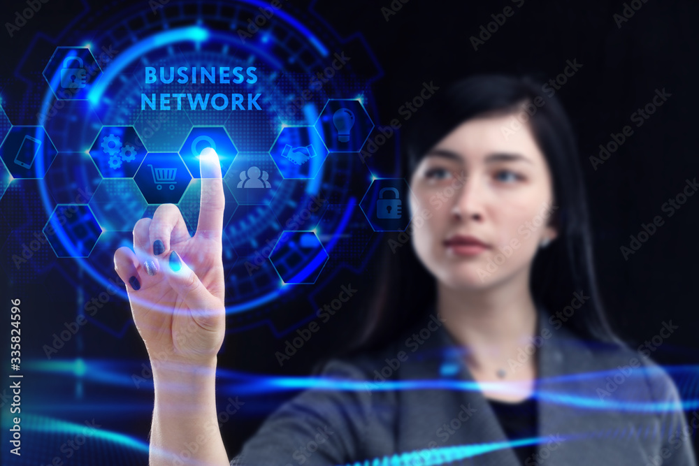 Business, Technology, Internet and network concept. Young businessman working on a virtual screen of the future and sees the inscription: Business network Business, Technology, Internet and network concept. Young businessman working on a virtual screen of the future and sees the inscription: Business network
