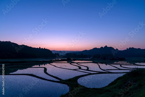 Landscape of rice fields in a mountain village in Japan